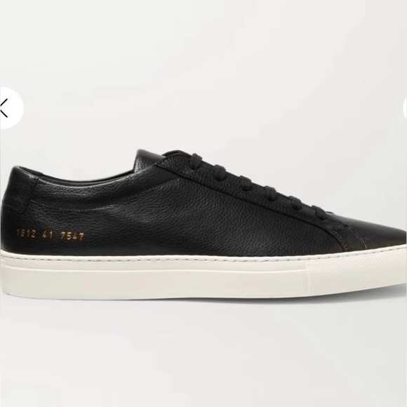 Woman by Common Projects black leather sneakers